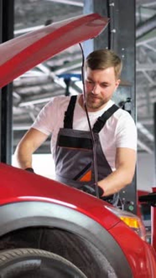 Red Car Repair Tire Wheel Motor Vehicle Automotive Design in Garage