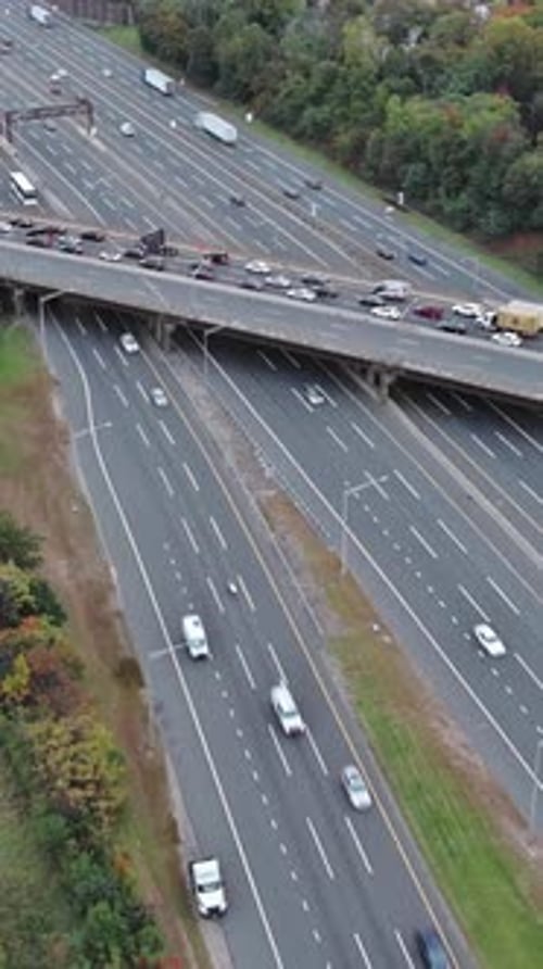 In Aerial View Vehicles Slowed Down on a Highway During Rush Hour Because of Heavy Traffic Jams