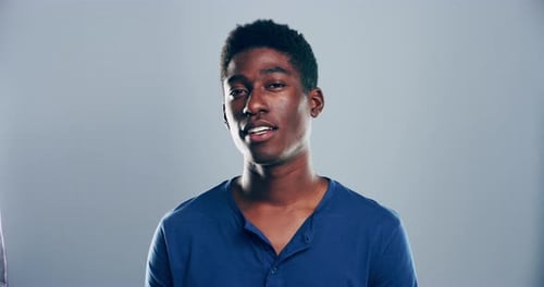 Smiling Young Man in Studio Close Up Portrait