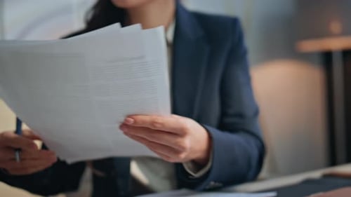 Closeup Woman Hands Writing Notes at Office Desk Serious Lady Taking Documents