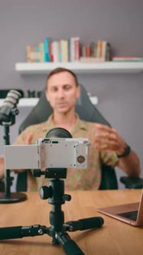 A Podcast Host is in the Studio Interacting and Discussing Various Topics with the Audience