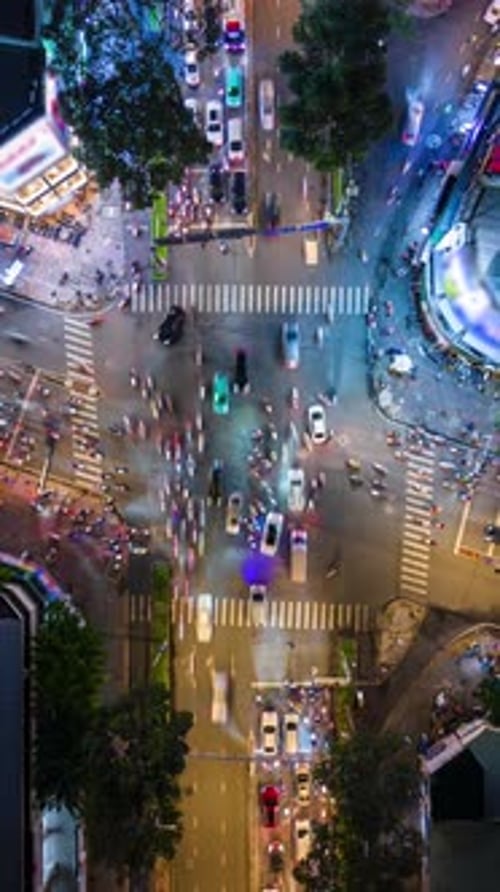 Aerial Timelapse of Evening Traffic at Intersection in Ho Chi Minh City Vietnam