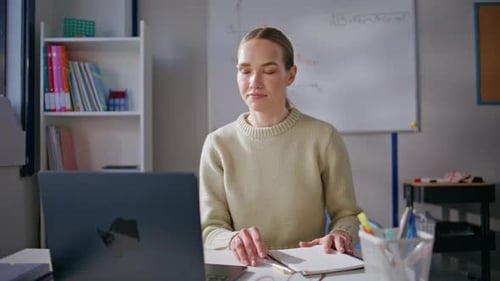 Smiling Young Woman Teaching Online Class