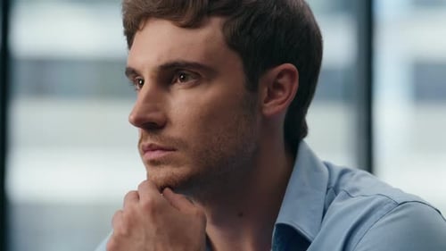 Pensive Employee Working in Office Closeup. Focused Businessman Looking Charts Computer Screen