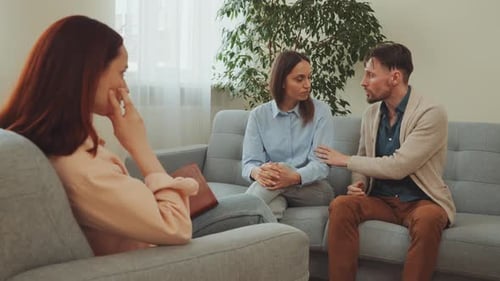 Couple Discussing Relationship Issues in Counseling Session