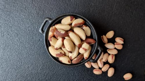 Brazil nuts, raw and shelled, are a source of selenium and a healthy food ingredient. Brazil nuts