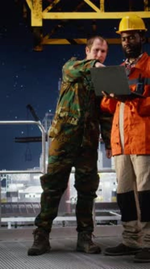 Vertical Video Naval Soldier Communicates Via Radio During Offshore Drilling Operation
