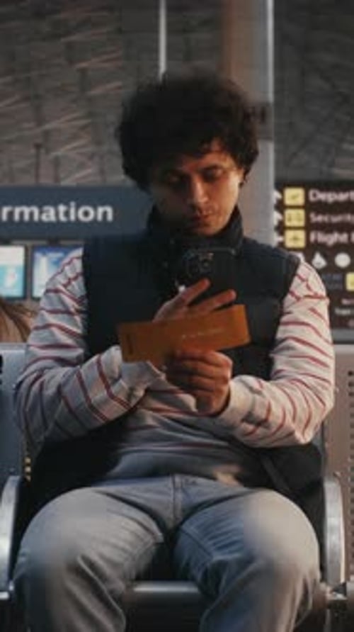 Young Male Passenger Scanning Digital Ticket and Walking to Boarding Gate