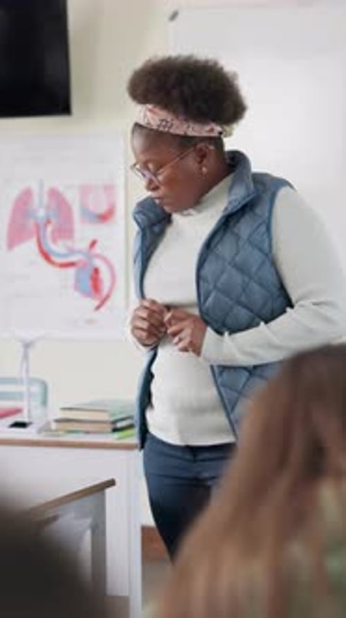 Teacher Addressing Students in Classroom