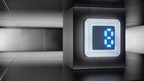 Dans une pièce futuriste, un grand écran fait le compte à rebours de 10 à 0. La caméra tourne autour du SC