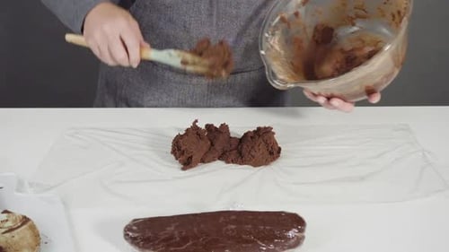 Step By Step Wrapping Cookie Dough Into the Plastic Wrap to Bake Chocolate Cookies