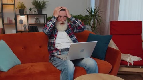 Overjoyed Senior Man Working on Laptop Celebrate Success Win Money in Lottery Get Online Good News