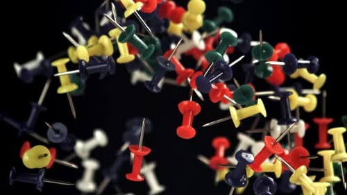 Multicolored Paper Clips Fly Up and Fall Down Filmed on a Highspeed Camera at 1000 Fps