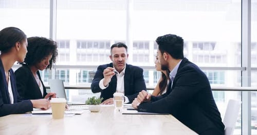 Diverse Business Team Meeting in a Bright Office