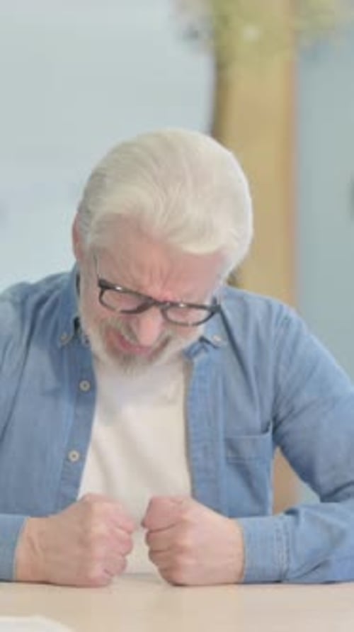 Old Man in Depression and Anxiety Feeling Uncomfortable, vertical video