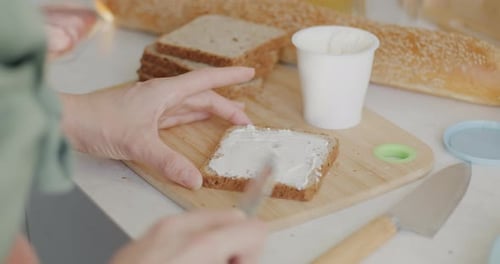 Preparing Bread with Cream Cheese at Home