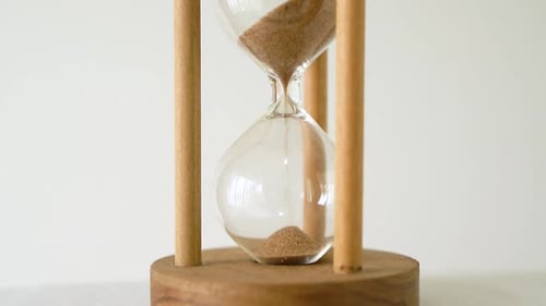 Hourglass in fast motion. Concept of the passage of time.