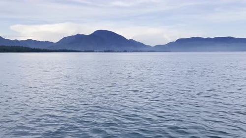 Scenic Ocean View with Distant Mountains