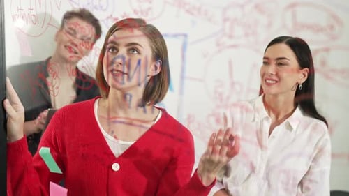 Business Team Brainstorming Together in an Office