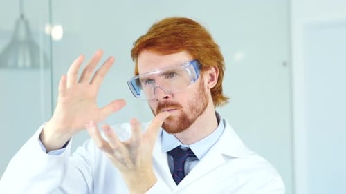 Focused Scientist Interacting with Hologram in Lab