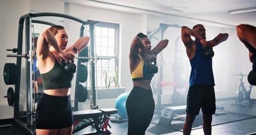 Fitness, personal trainer and athletes with weights in gym for group training with arm workout