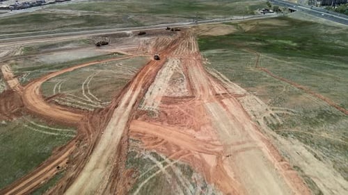 Aerial view construction heavy machinery highway expansion project