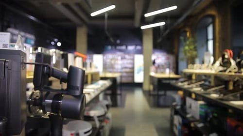 A Lively Video Showcases a Bustling Electronics Store Full of Tech