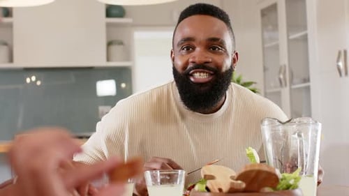 Friends and Family Enjoying Meal Together at Home