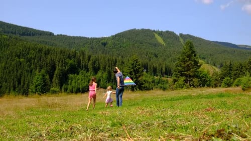 Family Flying a Kite Selective Focus