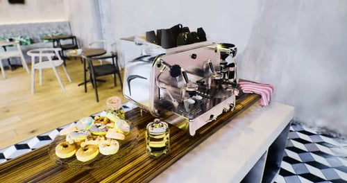 Freshly Brewed Coffee and Delightful Pastries in a Cozy Cafe Setting