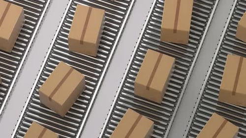 Cardboard boxes moving on a warehouse conveyor belt system