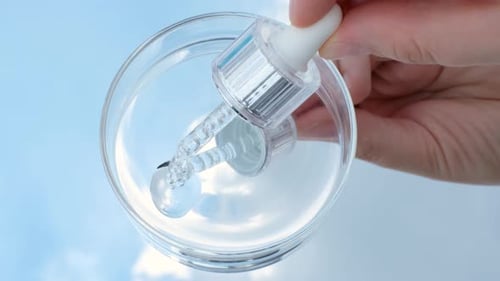 Clear Liquid Being Extracted with Pipette