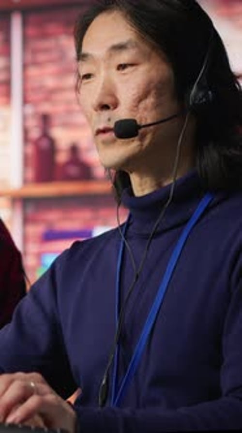 Vertical Video Call Center Admin Team Working Together to Provide Live Chat Support