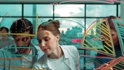 Diverse Team Brainstorming Together in a Modern Office