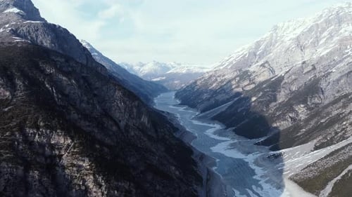 Aerial view of mountains and river, Italy.