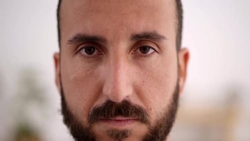 Man Opens Eyes in Slow Motion Close Up