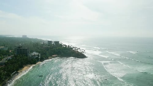 Seaside Tropical City View From Drone Aerial View of a Little Resort Town on Sea Shore Buildings