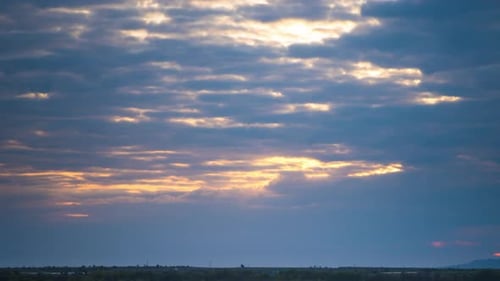 Rays of the Sun Shine Through Clouds Over Black Sea