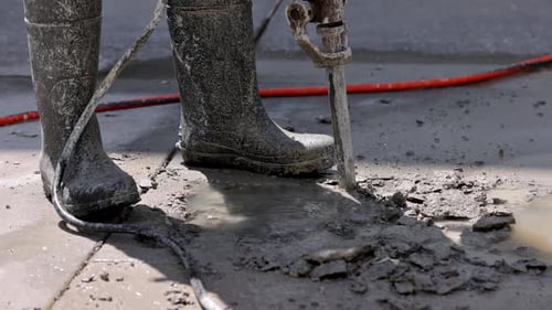 Jack Hammer brise du béton.