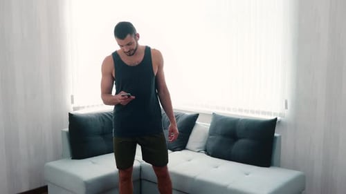 Muscular Man Doing Cardio Warmup in Home