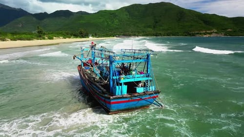 Fishing Boat with a Big Catch of Fish Stranded with a Catch Aerial View Drone Sunset Summer