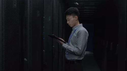 Young Adults Working in Modern Data Center