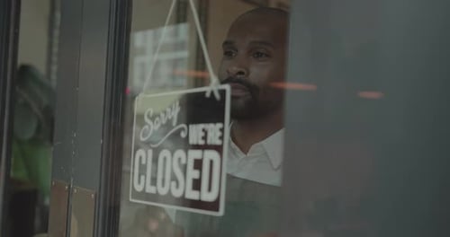 Small Business African American Store Owner Opening for business