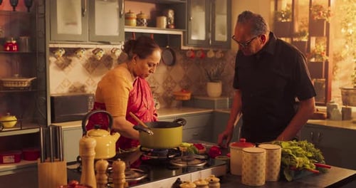 Couple Cooking Together in a Cozy Kitchen
