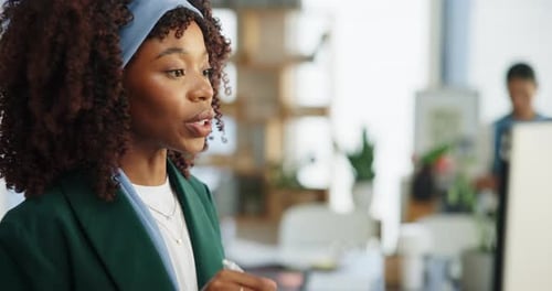 Businesswoman Talking in Office at Whiteboard Presentation