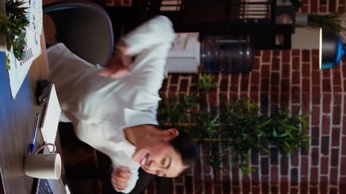 Young Woman Working Late at the Office