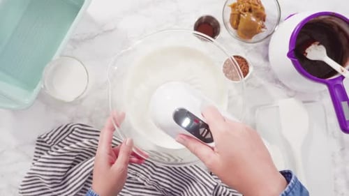 Time Lapse Flat Lay Step By Step Preparing Homemade Chocolate Ice Cream in a Hand Kitchen Mixer
