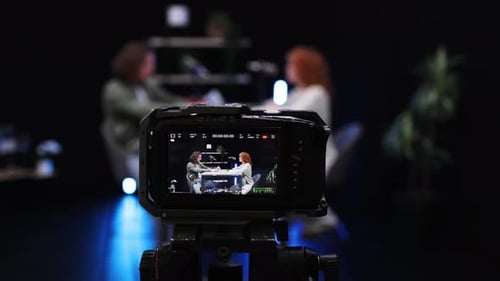 Filming Young Adults Recording a Podcast in Studio