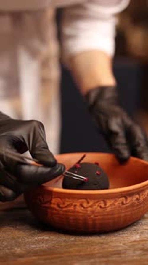 Pastry chef prepares delicious desserts at the restaurant