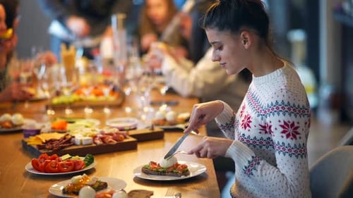 Woman Preparing Avocado Toast at a Cozy Brunch